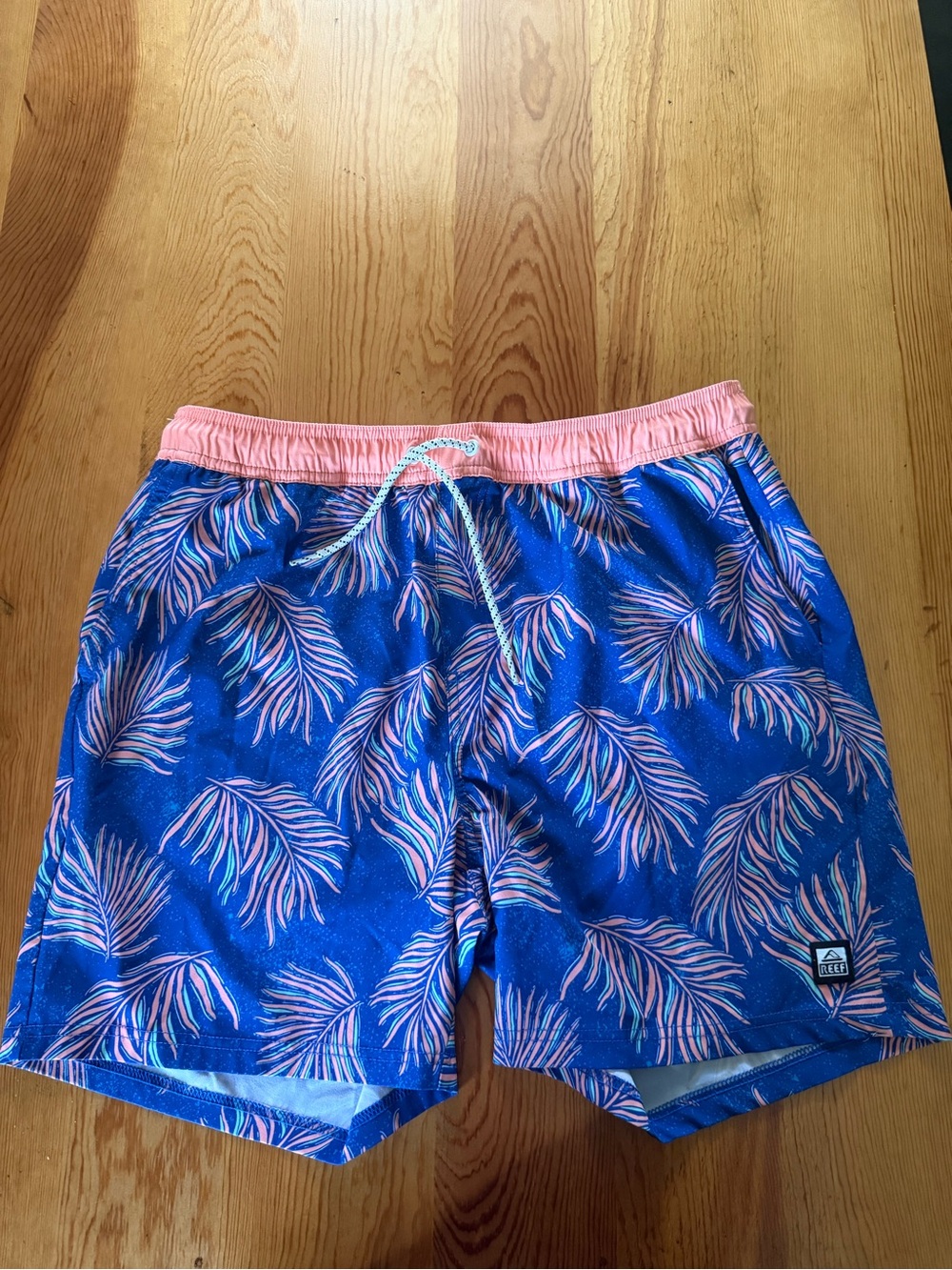 Reef Men's Blue Swim Shorts with Pink Palm Leaf Print